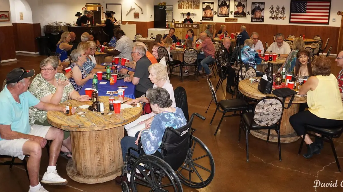 Audience having dinner at Firelight Barn Dinner Theater
