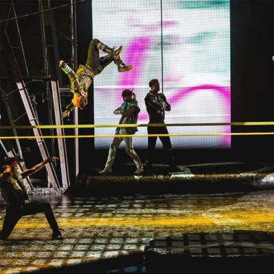 Dancers performing a flip in Michael Jackson ONE