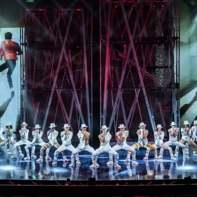 Dancers dressed in white performing Michael Jackson ONE