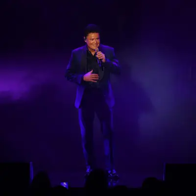 Donny Osmond sings on stage