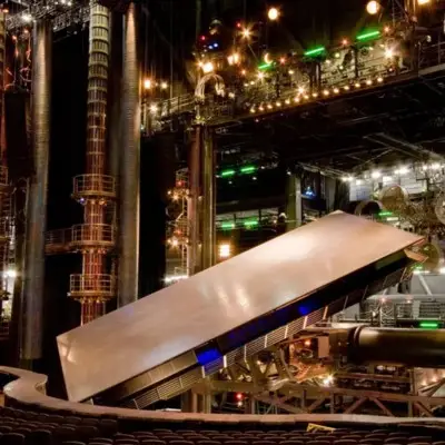 The impressive stage of Cirque du Soleil's KÀ show, featuring the massive sand cliff deck tilted upwards