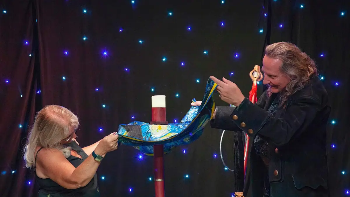 Losander making a table float with the audience