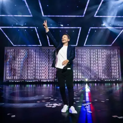 Mat Franco performing on stage