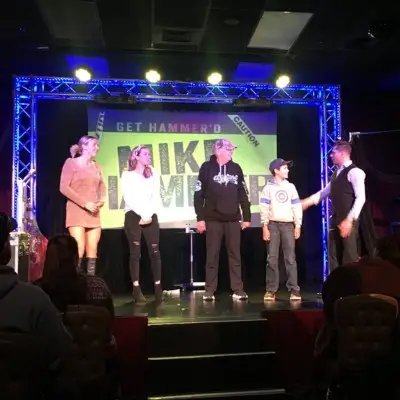 Hammer with audience performing a trick