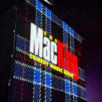 Neon sign at the Mac King show