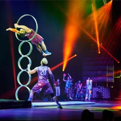 Acrobats performing with hoops at Mad Apple, Las Vegas