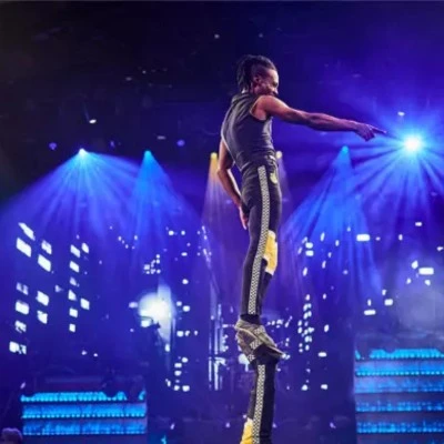 Performer balancing on a unicycle at Mad Apple, Las Vegas.