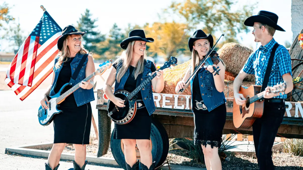 Performers of the 31 String Showdown singing in an outdoor setting