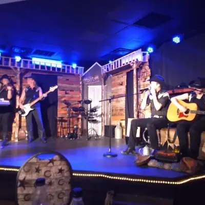 Band performing at 31 String Showdown in the Firelight Barn theater