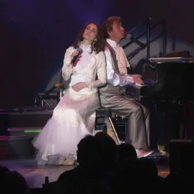 The brother sister duo singing and playing the piano in Las Vegas
