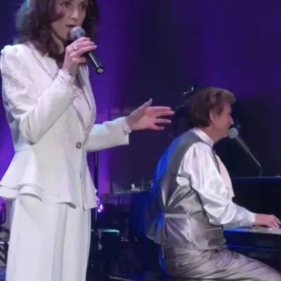 The female lead performing at Carpenters legacy in V theater