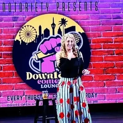 A female comedian performing at Notoriety