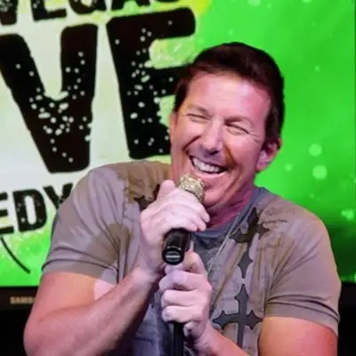 Comedian with mic at Las Vegas Live Comedy Club
