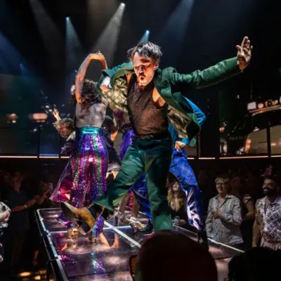 Dancers on a platform for DiscoShow in Las Vegas