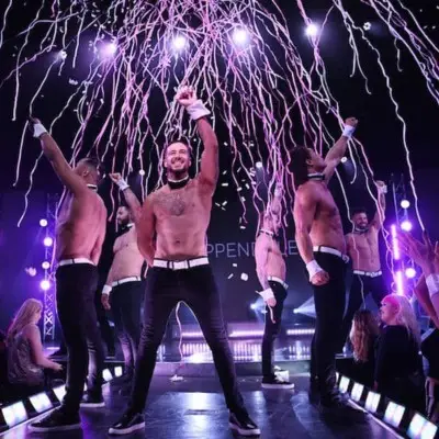 Dancers on stage under confetti during Chippendales in Las Vegas