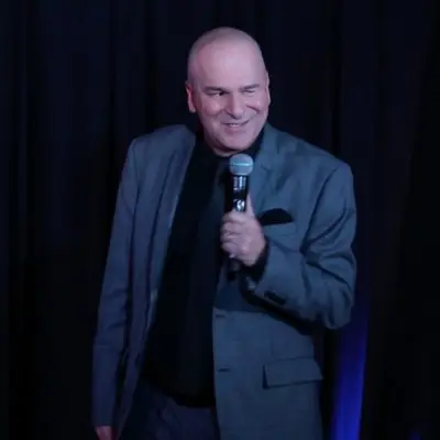 A comedian performing on stage in Las Vegas