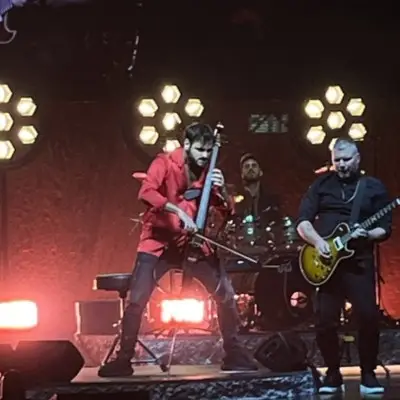 HAUSER performing on stage with other musicians