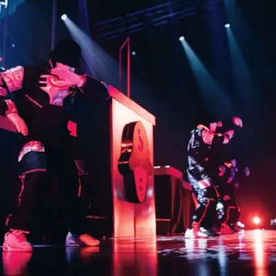 abbawockeez dancers on stage for show in Las Vegas Jabbawockeez performance with dramatic lighting, Las Veg