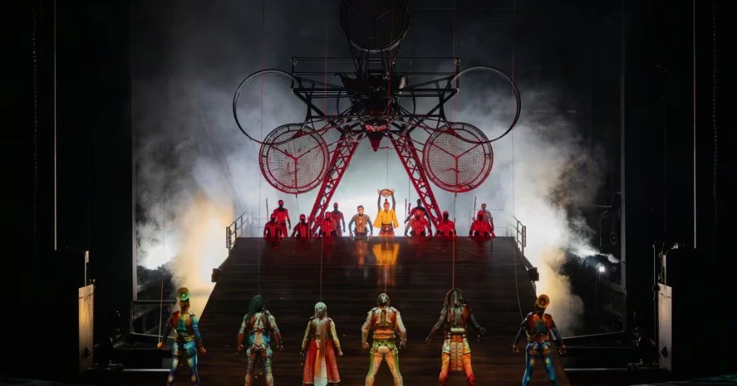 KÀ by Cirque du Soleil performers in a dramatic action scene with dynamic lighting and stage effects.