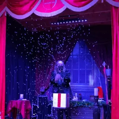 Losander making gift box levitate at the Magic of Christmas Show