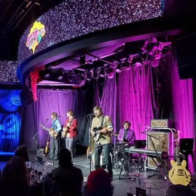 The members of the show performing at the Ahern Hote