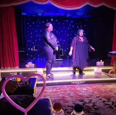 Luna Shimada with audience member at the Witches and Warlocks show