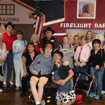 Mama’s Wranglers posing with audience members after the show