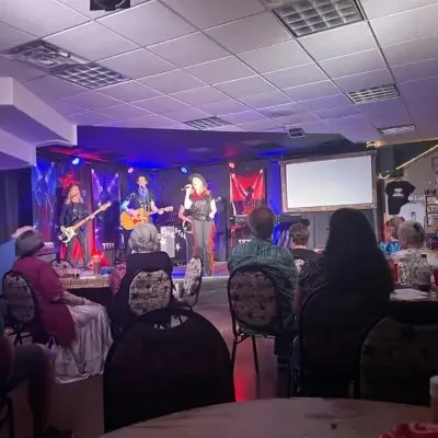 Mama’s Wranglers performing in glittery t-shirts