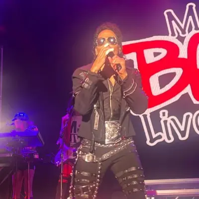 The look-like of MJ on stage performing