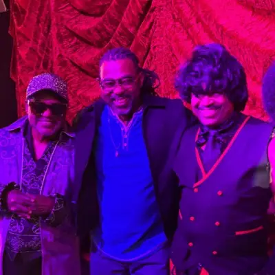 Members of Musical Journey With James Brown & Motown posing with fans