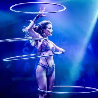 Performer balancing metal rings at the Atomic Saloon Show in Vegas
