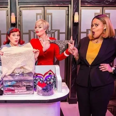 Performers posing with several kinds of lingerie at Menopause the Musical