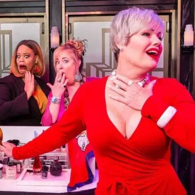 Performers making shocked expressions at Menopause the Musical