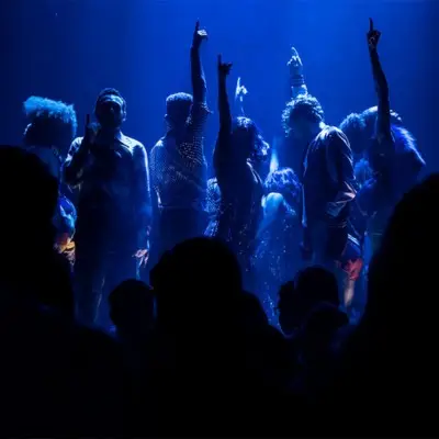 Performers under dramatic lighting for DiscoShow in Vegas