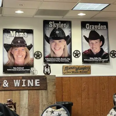Posters of Mama’s Wranglers members at the Firelight Barn theater