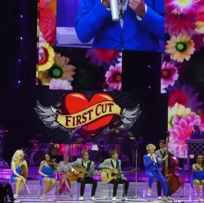 Stewart and his team sitting down and performing