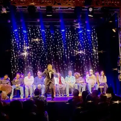 Steve Falcon dressed as Santa Claus at the Comedy Hypnosis Hour show