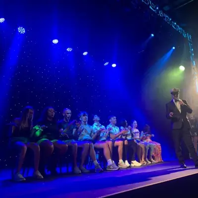 Steve Falcon wearing a captain’s hat at the Comedy Hypnosis Hour show