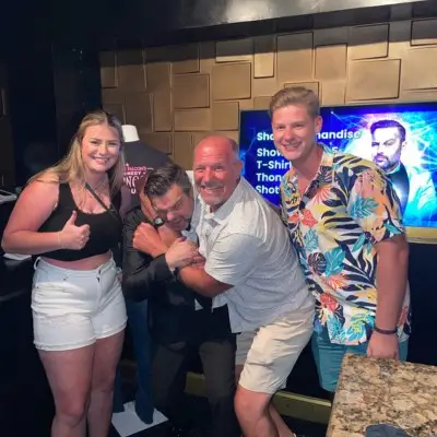 Steve Falcon posing with audience after the Comedy Hypnosis Hour show