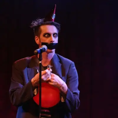 Tape Face with balloon during show in Las Vegas