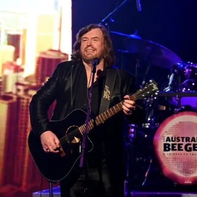 The artist paying a guitar during his performance at the Excalibur Hotel and Casino