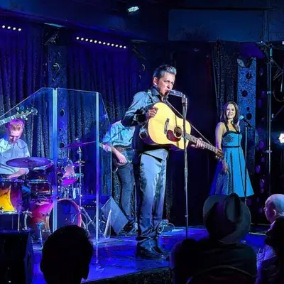 Cash After Dark and team performing at the OYO Hotel