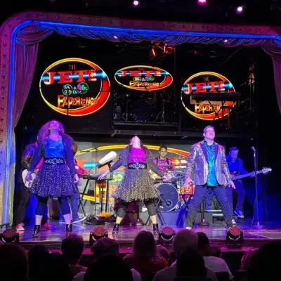 Members from THE JETS performing at Planet Hollywood
