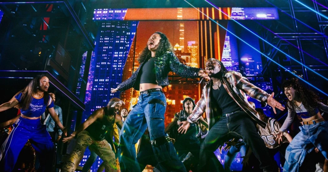 Cast of Hell’s Kitchen performing on stage with lead actress Maleah Joi Moon.
