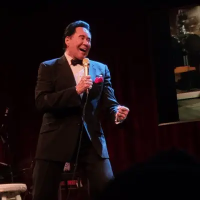 Wayne Newton posing with audience at the meet and greet event after the Up Close and Personal show